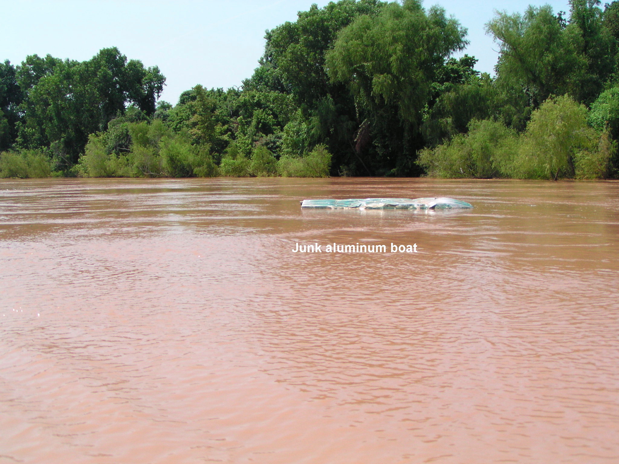 This big, mean river beat up this little aluminum boat somewhere below Waco, Texas