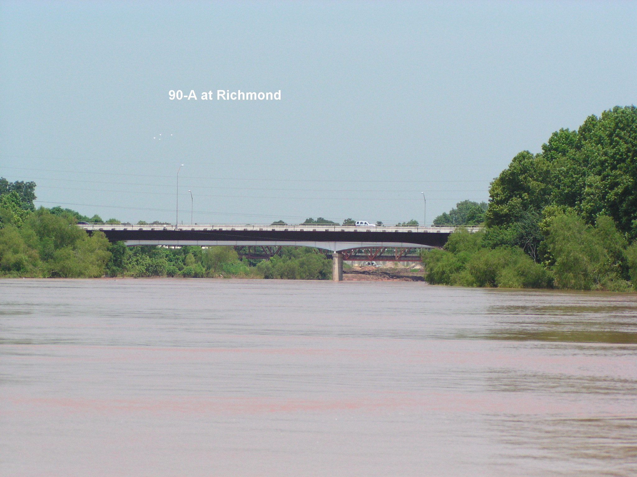The railroad, hidden behind  90A, Was the first RR in Texas. The steam engines went down the bank, across a barge and up the other bank in the 1850's.